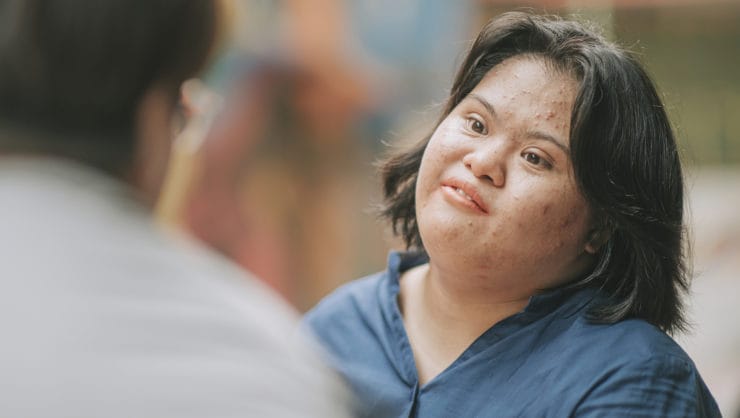 A young woman with Down syndrome.