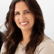 Portrait of Melissa Danielsen, a woman with shoulder-length brown hair.